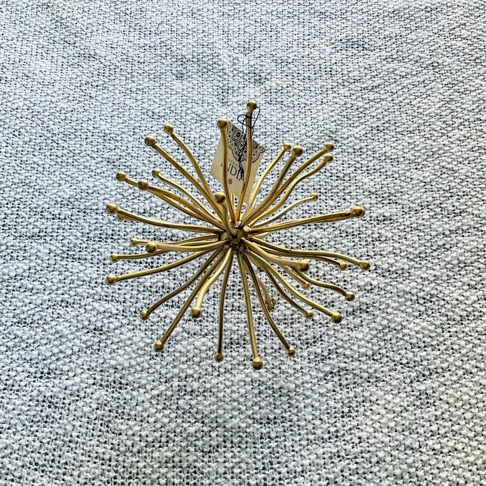 Three Hands gold orb decor